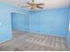 Bedroom with light blue walls and neutral carpet, sliding mirrored closet at 710 Strawberry Pl, Henderson, NV 89002