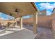 Charming covered patio with ceiling fans and dining set, ideal for enjoying outdoor meals at 7707 W Diablo Dr, Las Vegas, NV 89113