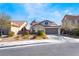 Well-maintained single-Gathering home featuring a two-car garage and neat front yard in a residential area at 792 Valley Rise Dr, Henderson, NV 89052