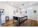 Bright game room with hardwood floors, recessed lighting, and an air hockey table at 792 Valley Rise Dr, Henderson, NV 89052