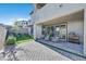 Inviting backyard featuring a paved patio, seating area, and lush landscaping perfect for outdoor entertaining at 796 Keys View Ave, Las Vegas, NV 89138