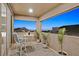 Relax on this cozy balcony with seating and potted plants offering scenic views, perfect for morning coffee at 796 Keys View Ave, Las Vegas, NV 89138