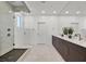 Modern bathroom with a glass-enclosed shower, dual sinks, and contemporary fixtures at 796 Keys View Ave, Las Vegas, NV 89138