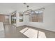 Spacious dining area with a modern chandelier and sliding glass doors to outdoor space at 796 Keys View Ave, Las Vegas, NV 89138