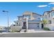 Contemporary two-story home featuring a two-car garage and modern architectural details during the day at 796 Keys View Ave, Las Vegas, NV 89138