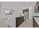 Stylish kitchen featuring a center island with seating and modern stainless steel appliances at 796 Keys View Ave, Las Vegas, NV 89138