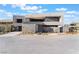 Contemporary home exterior with clean lines, modern design, and lush landscaping, offering a stylish and inviting atmosphere at 801 Dragons Eye Dr, Henderson, NV 89012