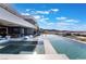 Enjoy the views from the infinity pool and spa with ample lounging space and sleek architectural design at 801 Dragons Eye Dr, Henderson, NV 89012