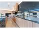Stylish kitchen featuring a long island, modern cabinetry, and a sleek design at 801 Dragons Eye Dr, Henderson, NV 89012