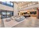 Bright and open floor plan, living room view to kitchen and expansive outdoor patio at 801 Dragons Eye Dr, Henderson, NV 89012