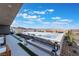 Modern backyard pool featuring integrated loungers, sleek design, and panoramic mountain views at 801 Dragons Eye Dr, Henderson, NV 89012