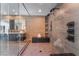 Modern bathroom shower featuring sleek fixtures, glass enclosure, and integrated seating at 801 Dragons Eye Dr, Henderson, NV 89012