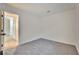 Bedroom with neutral carpet, recessed lighting, and a doorway to hallway at 8024 Hurricane Cove Ct, Las Vegas, NV 89129