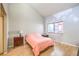 Bright bedroom with a large window, and laminate floors at 8229 Willeta Ave, Las Vegas, NV 89145