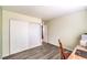 Bedroom featuring sliding door closet and view of office space at 8229 Willeta Ave, Las Vegas, NV 89145