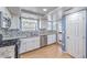 Traditional-style kitchen featuring stainless steel appliances and beautiful granite countertops at 8229 Willeta Ave, Las Vegas, NV 89145