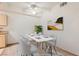 A well-lit dining area featuring contemporary furnishings and neutral tones, offering a comfortable dining experience at 8250 N Grand Canyon Dr # 2102, Las Vegas, NV 89166