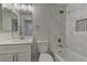 Bright bathroom featuring updated fixtures, a shower-tub combo, and a modern vanity at 832 Vineyard Vine Way, North Las Vegas, NV 89032