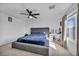 Sunlit bedroom boasts a contemporary platform bed, soft carpeting, and light walls for a cozy atmosphere at 854 Earth Luster Rd, Las Vegas, NV 89178