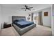 Bright bedroom showcasing a modern platform bed, soft carpet, and neutral-toned walls illuminated by natural light at 854 Earth Luster Rd, Las Vegas, NV 89178