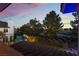 Aerial view of home showing a swimming pool and golf course views from the backyard at 8701 Robinson Ridge Dr, Las Vegas, NV 89117