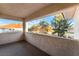 A covered balcony with golf course views offers an inviting outdoor living space at 8701 Robinson Ridge Dr, Las Vegas, NV 89117