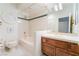 Bathroom featuring a bathtub with tile surround and a single sink vanity at 8701 Robinson Ridge Dr, Las Vegas, NV 89117