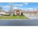 Charming single story home with well-manicured lawn and inviting red tile roof at 8701 Robinson Ridge Dr, Las Vegas, NV 89117