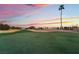 Expansive golf course view showcasing green fairways, sand traps, and luxury homes at 8701 Robinson Ridge Dr, Las Vegas, NV 89117