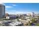 Expansive city view from a private balcony showcasing nearby buildings and distant mountains at 900 Las Vegas Blvd # 804, Las Vegas, NV 89101