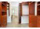 Well-organized walk-in closet with custom shelving and drawers, leading to the bathroom at 900 Las Vegas Blvd # 804, Las Vegas, NV 89101