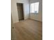 Bedroom featuring closet, natural light, and modern floors at , Las Vegas, NV 89102