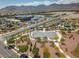 Aerial view of community park with basketball court, picnic areas, and surrounding neighborhood at 10421 Mount Washington Ave, Las Vegas, NV 89166