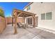 Enjoy the covered patio in this backyard, great for outdoor entertaining, with a fenced yard and desert landscaping at 10421 Mount Washington Ave, Las Vegas, NV 89166