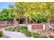 This is a photo of the clubhouse with an entrance and beautifully landscaped front yard, with native desert plants at 10421 Mount Washington Ave, Las Vegas, NV 89166