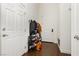 Bright entryway with wood floors, coat rack, and white doors at 1092 Via Corto St, Henderson, NV 89011