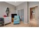 Nicely decorated bedroom with light gray walls, wood floors, and a sliding-door closet, showcasing style and functionality at 11023 Bellatrix Ct, Las Vegas, NV 89135