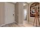 Home entryway with wood flooring and a view to another room at 11023 Bellatrix Ct, Las Vegas, NV 89135