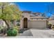 Charming single-story home featuring a two-car garage, well-maintained landscaping, and a welcoming entrance at 11023 Bellatrix Ct, Las Vegas, NV 89135