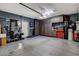 Organized garage with storage cabinets and epoxy flooring at 11023 Bellatrix Ct, Las Vegas, NV 89135