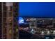 Nighttime city view with a glittering cityscape stretching to the horizon at 135 E Harmon Ave # 2821, Las Vegas, NV 89109