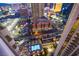 High-angle view of a vibrant cityscape with a pool and hotel visible below at 135 E Harmon Ave # 2821, Las Vegas, NV 89109