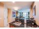 Well-lit kitchen area with dark granite countertops, wood cabinets, and stainless steel appliances at 135 E Harmon Ave # 2821, Las Vegas, NV 89109