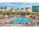 Luxurious pool area with lounge chairs and cabanas for relaxation at 135 E Harmon Ave # 2821, Las Vegas, NV 89109