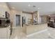 Well-equipped kitchen with granite countertops, stainless steel appliances, and ample cabinet space at 1616 Langston Hughes St, Henderson, NV 89052