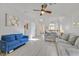 Spacious living room featuring wood floors, modern decor, and plenty of natural light at 1646 Little Crow Ave, Las Vegas, NV 89123