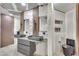 Contemporary bathroom featuring dual vanity sinks and black toilet fixtures at 1805 Ivanhoe Way, Las Vegas, NV 89102