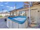 Hot tub with a view, featuring a spiral staircase leading to a roof deck with backyard access at 1805 Ivanhoe Way, Las Vegas, NV 89102