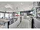 Open kitchen area featuring stainless steel appliances, large island, and modern finishes at 1805 Ivanhoe Way, Las Vegas, NV 89102