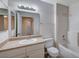 Bathroom with a single sink vanity and a shower-tub combo with tiled walls at 1881 W Alexander Rd # 1135, North Las Vegas, NV 89032